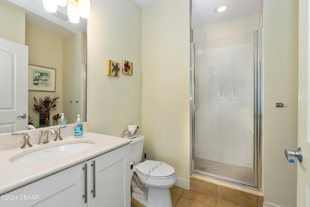 1925 S Atlantic Ave Unit 205, Daytona Beach Shores, FL 32118 - bathroom featuring vanity, toilet, a stall shower, tile patterned floors, and recessed lighting