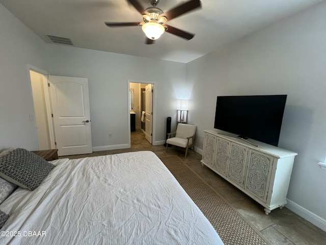 bedroom with ensuite bath and ceiling fan