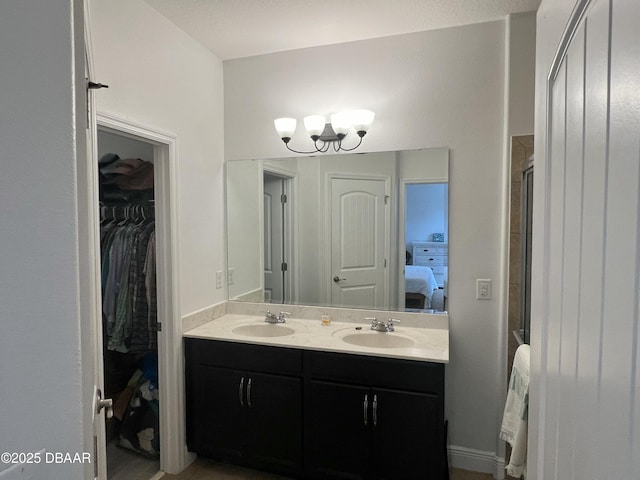 bathroom with vanity and an enclosed shower