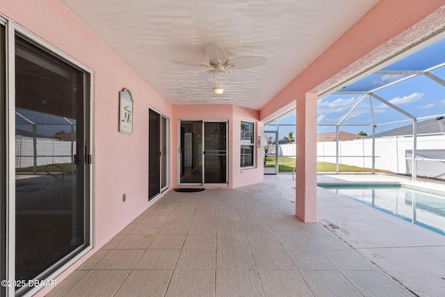 7 Sea Park Ter, Ormond Beach, FL 32176 - view of pool with a fenced in pool, a ceiling fan, a patio area, glass enclosure, and fence