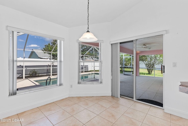 7 Sea Park Ter, Ormond Beach, FL 32176 - unfurnished dining area with a ceiling fan, baseboards, and tile patterned flooring