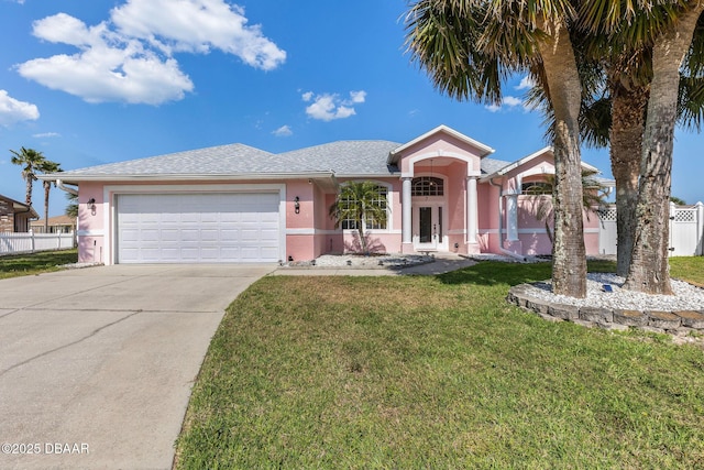 7 Sea Park Ter, Ormond Beach, FL 32176 - ranch-style home featuring driveway, a garage, fence, and stucco siding