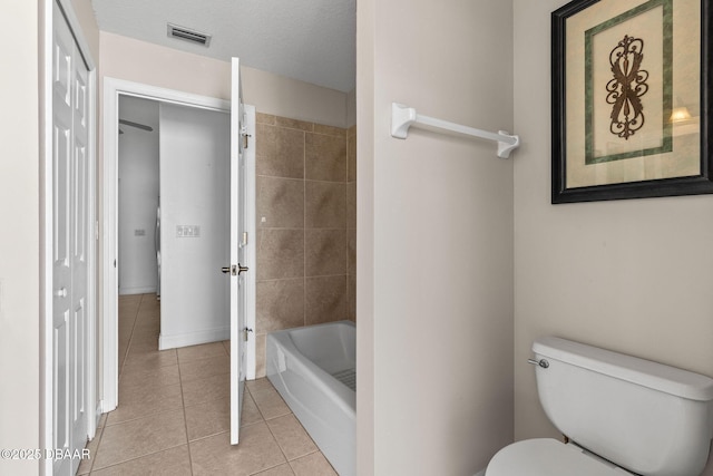 7 Sea Park Ter, Ormond Beach, FL 32176 - full bathroom featuring toilet, bathing tub / shower combination, tile patterned flooring, and visible vents