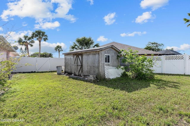 7 Sea Park Ter, Ormond Beach, FL 32176 - exterior space with an outbuilding, a fenced backyard, and a gate