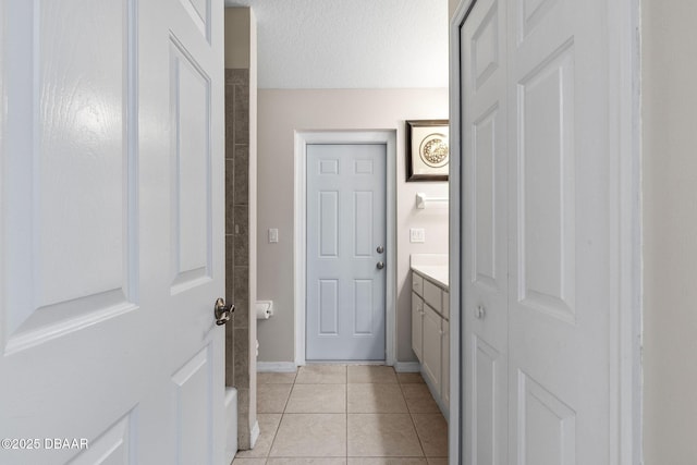 7 Sea Park Ter, Ormond Beach, FL 32176 - bathroom featuring tile patterned floors, vanity, and baseboards