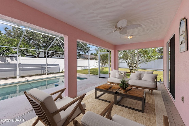 7 Sea Park Ter, Ormond Beach, FL 32176 - sunroom featuring outdoor lounge area, a swimming pool, and a ceiling fan
