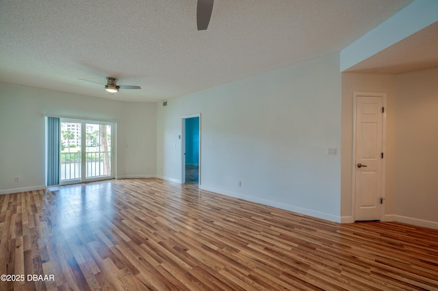 66 Rivers Edge Ln Unit 66, Palm Coast, FL 32137 - spare room featuring ceiling fan, wood finished floors, and a textured ceiling