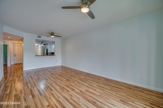 66 Rivers Edge Ln Unit 66, Palm Coast, FL 32137 - unfurnished living room featuring a ceiling fan and light wood-type flooring
