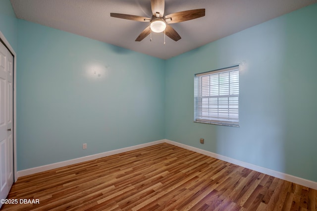 66 Rivers Edge Ln Unit 66, Palm Coast, FL 32137 - unfurnished bedroom featuring a closet, wood finished floors, and a ceiling fan