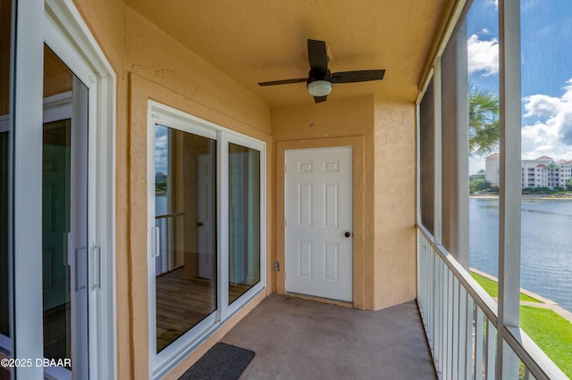 66 Rivers Edge Ln Unit 66, Palm Coast, FL 32137 - unfurnished sunroom featuring a ceiling fan and a water view