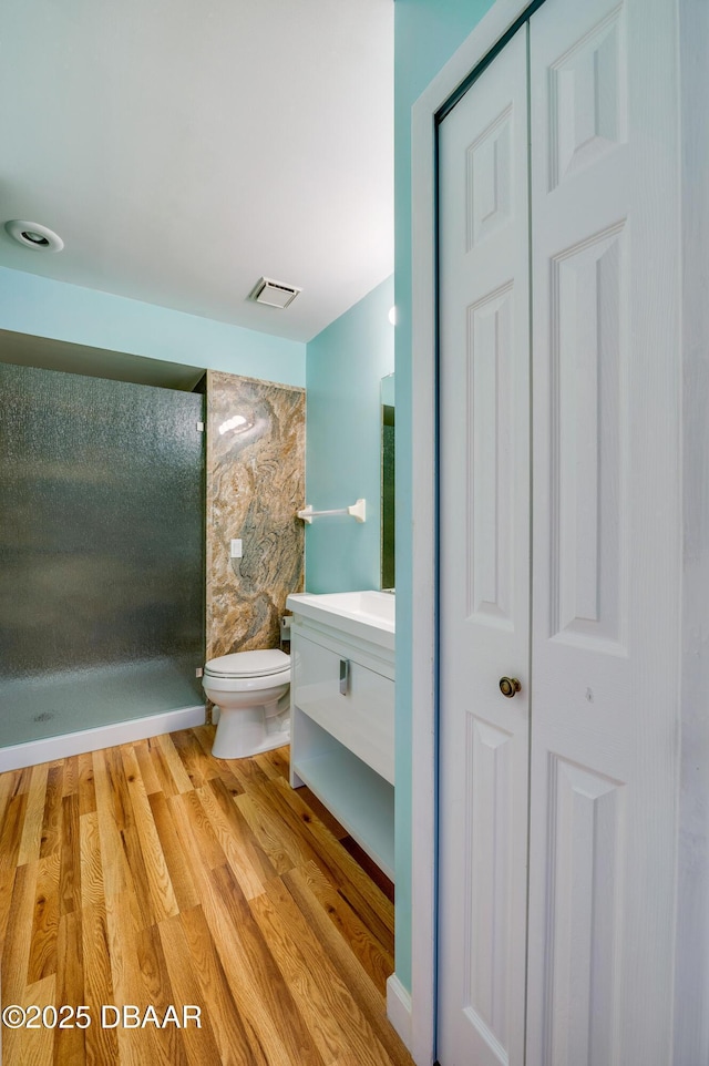 66 Rivers Edge Ln Unit 66, Palm Coast, FL 32137 - full bath featuring vanity, wood finished floors, a closet, and a shower