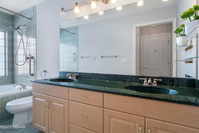 bathroom featuring tile patterned flooring, vanity, and tiled shower / bath combo