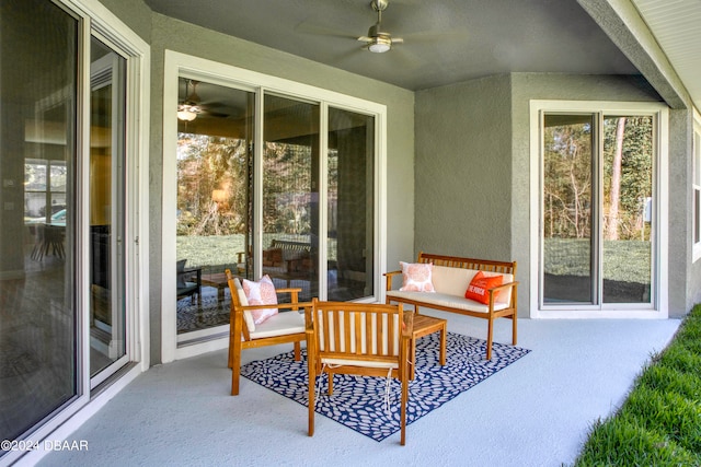 view of patio / terrace featuring ceiling fan