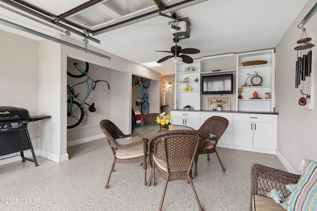 dining space with ceiling fan