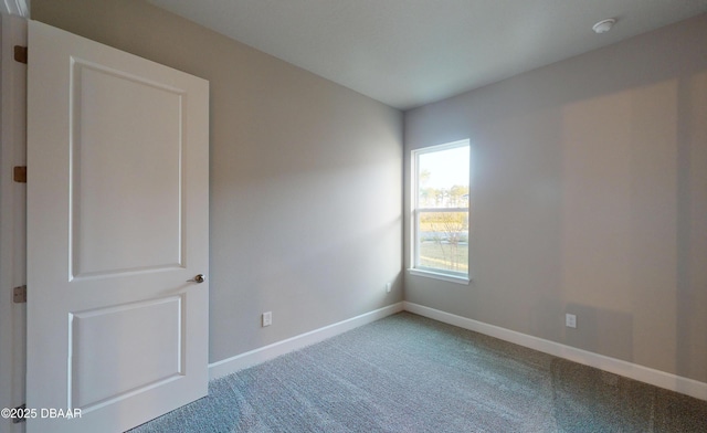 view of carpeted spare room