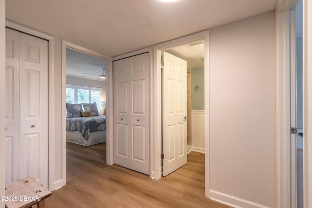 hall featuring light wood-style floors