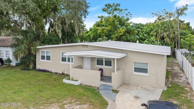 view of front of house with a front yard