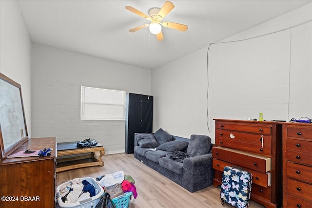 sitting room with ceiling fan and light hardwood / wood-style flooring