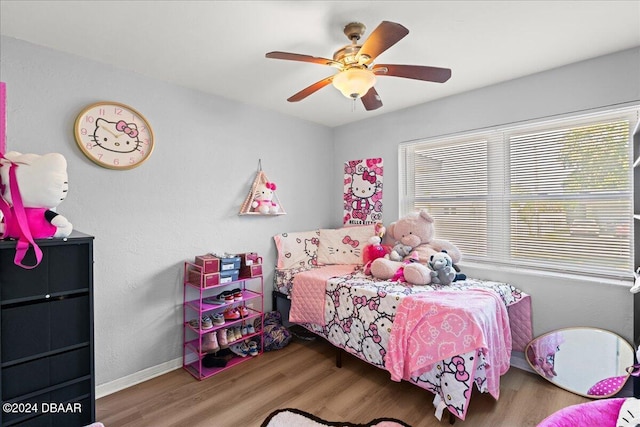 bedroom featuring ceiling fan and wood-type flooring