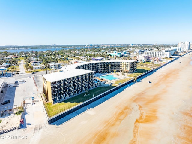 bird's eye view with a beach view and a water view