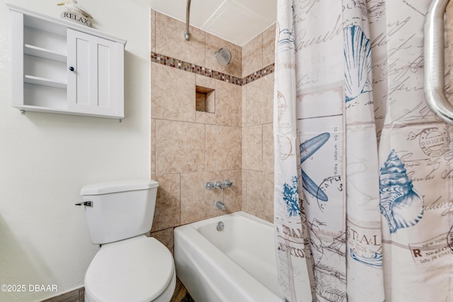 bathroom featuring toilet and shower / bath combination with curtain