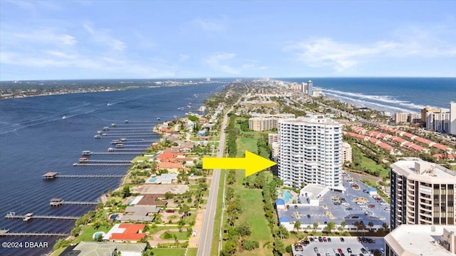 birds eye view of property featuring a water view