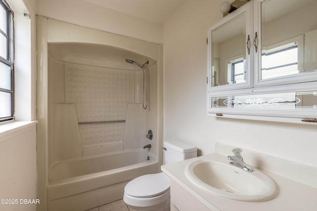 full bath featuring bathtub / shower combination, vanity, and toilet