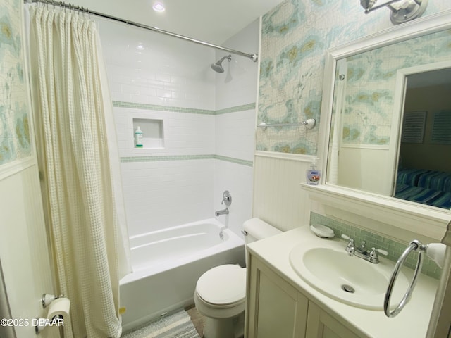 full bathroom featuring vanity, decorative backsplash, shower / bathtub combination with curtain, and toilet