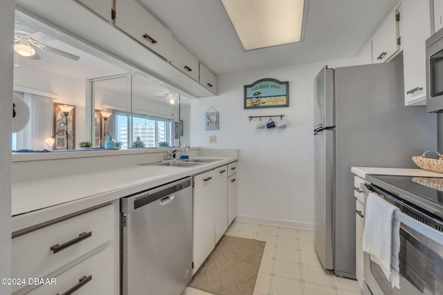 kitchen with white cabinetry, sink, ceiling fan, and appliances with stainless steel finishes