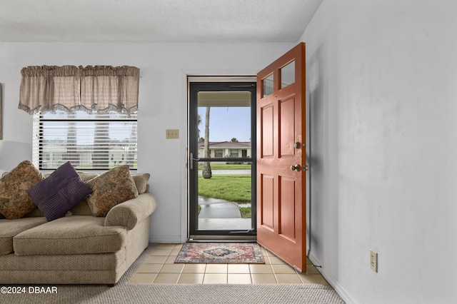 133 Cardinal Dr, Ormond Beach, FL 32176 - foyer entrance featuring light tile patterned floors
