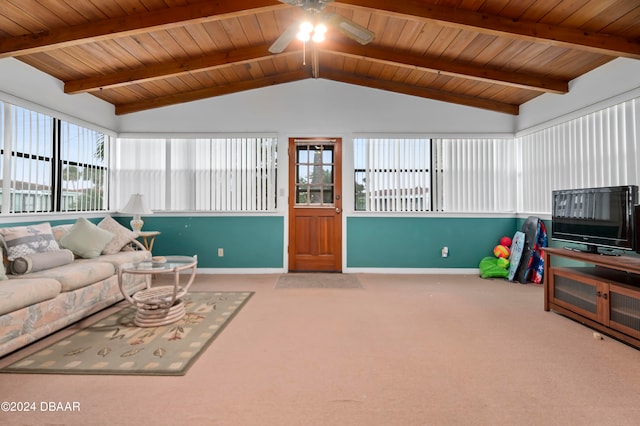 carpeted living room featuring wood ceiling, a healthy amount of sunlight, and vaulted ceiling with beams