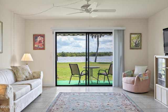 tiled living room with ceiling fan