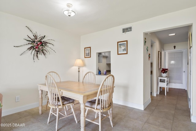 view of tiled dining room