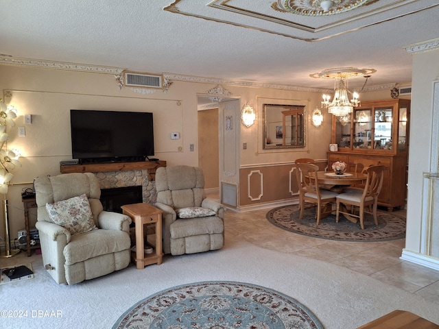 living room with a stone fireplace, tile patterned flooring, ornamental molding, and a textured ceiling