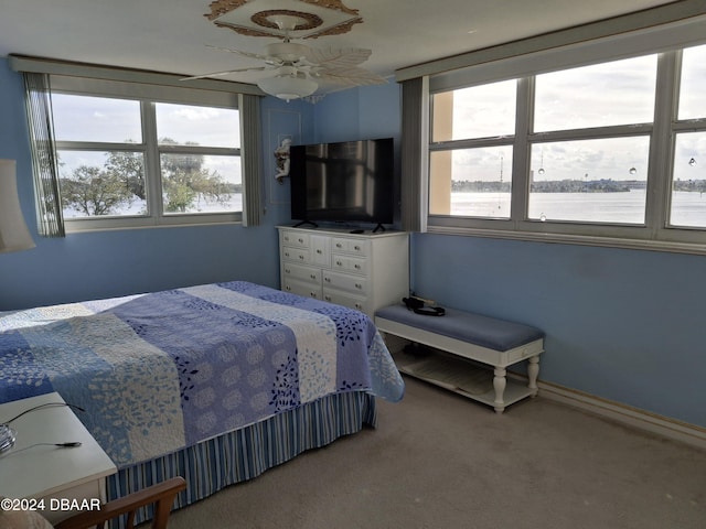 bedroom featuring carpet floors and ceiling fan