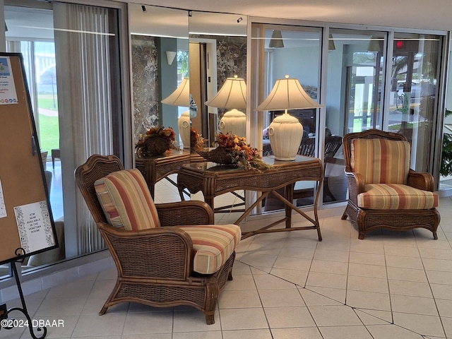 living area featuring light tile patterned flooring