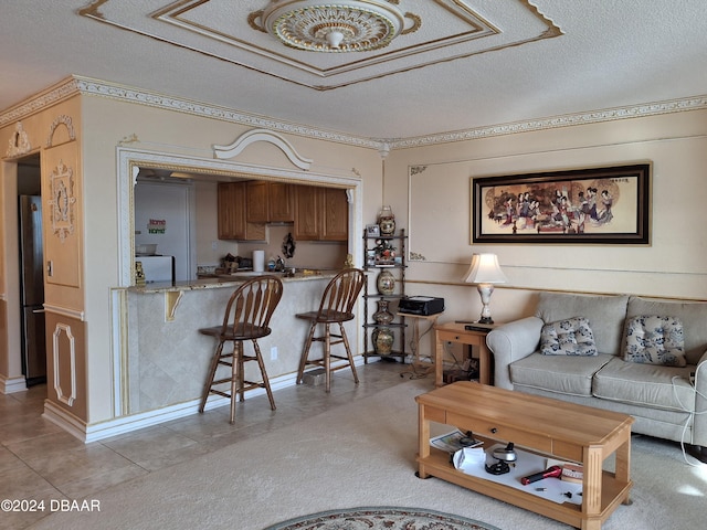 living room featuring a textured ceiling