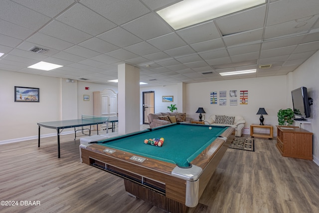 rec room featuring pool table, a paneled ceiling, and hardwood / wood-style flooring