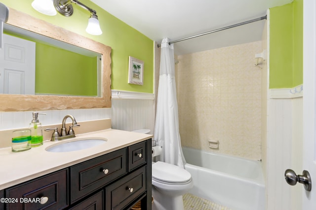 full bathroom with vanity, shower / bath combination with curtain, and toilet