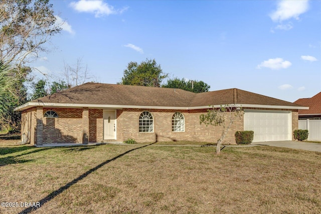 single story home featuring a garage and a front lawn