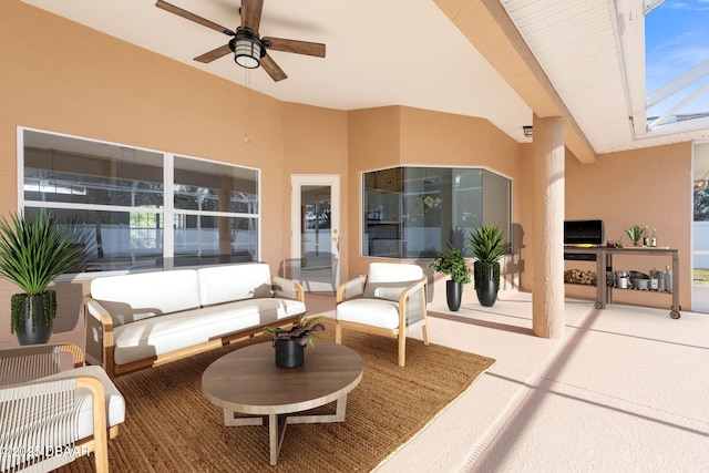 view of patio featuring outdoor lounge area and a ceiling fan