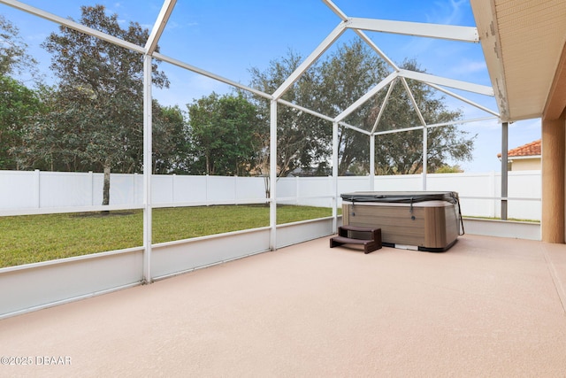 unfurnished sunroom featuring a hot tub
