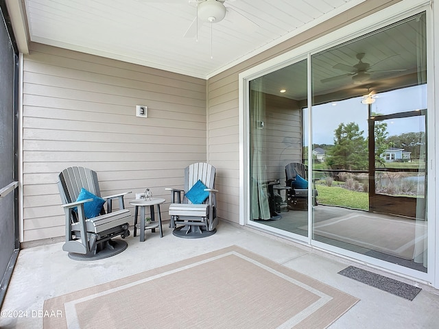 exterior space featuring ceiling fan