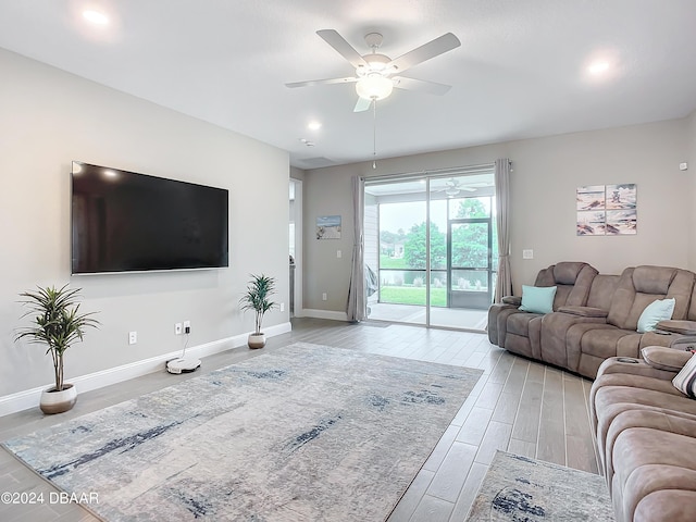 4155 Clifden Dr, Ormond Beach, FL 32174 - living room featuring light hardwood / wood-style flooring and ceiling fan