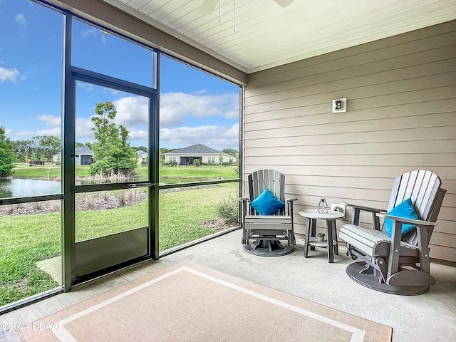 4155 Clifden Dr, Ormond Beach, FL 32174 - sunroom / solarium featuring a water view and ceiling fan