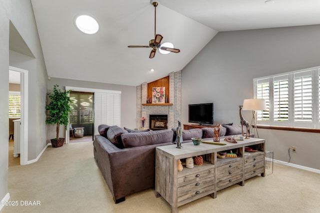 97 Oxbow Trl, Ormond Beach, FL 32174 - living room featuring light carpet, a fireplace, baseboards, ceiling fan, and plenty of natural light