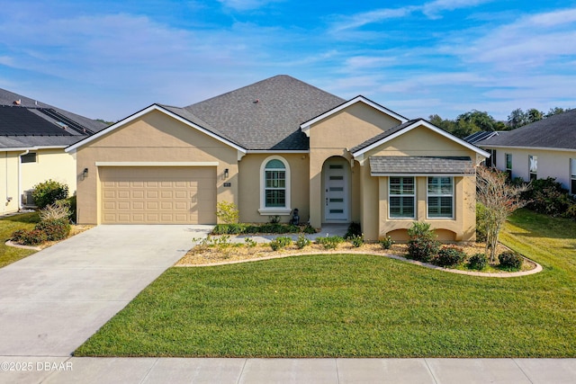 ranch-style house with a garage and a front yard