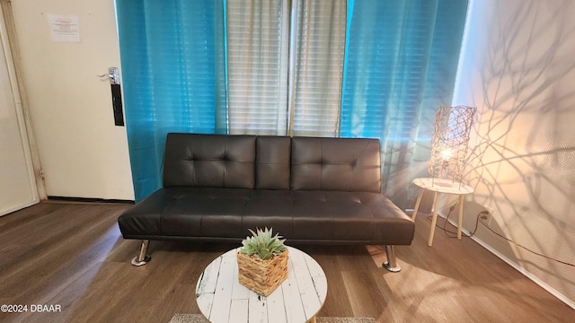 sitting room with hardwood / wood-style floors