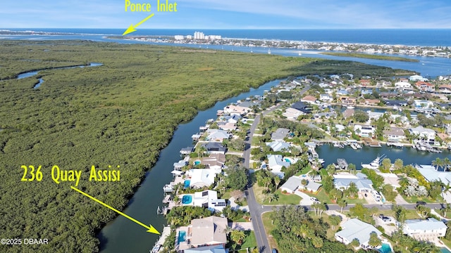 bird's eye view with a water view