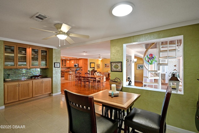 dining area featuring ceiling fan